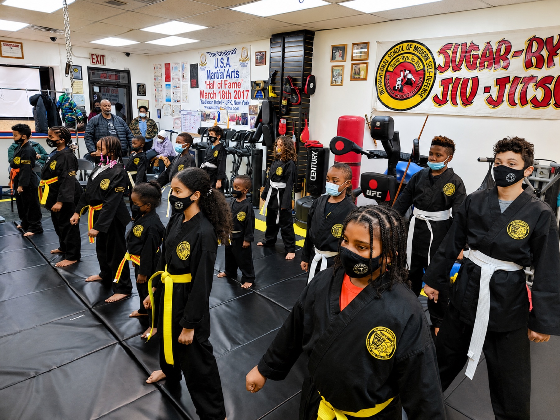 Youth Worthy Ryu class lined up on the dojo mat