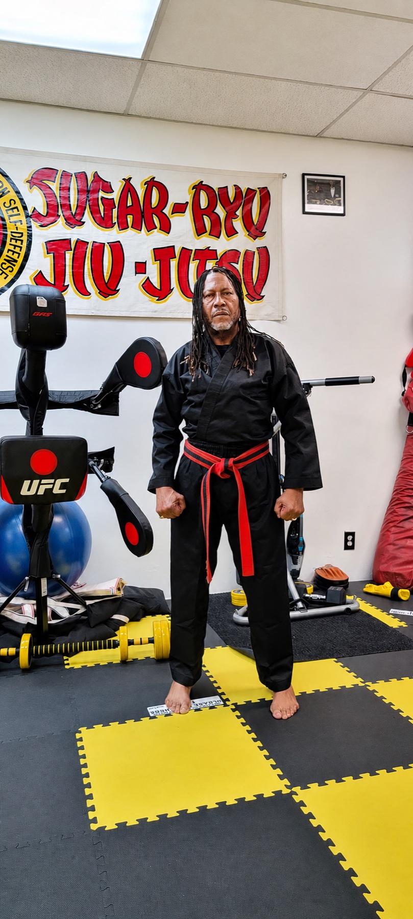 Professor Kenneth Worthy standing in the Worthy Ryu dojo